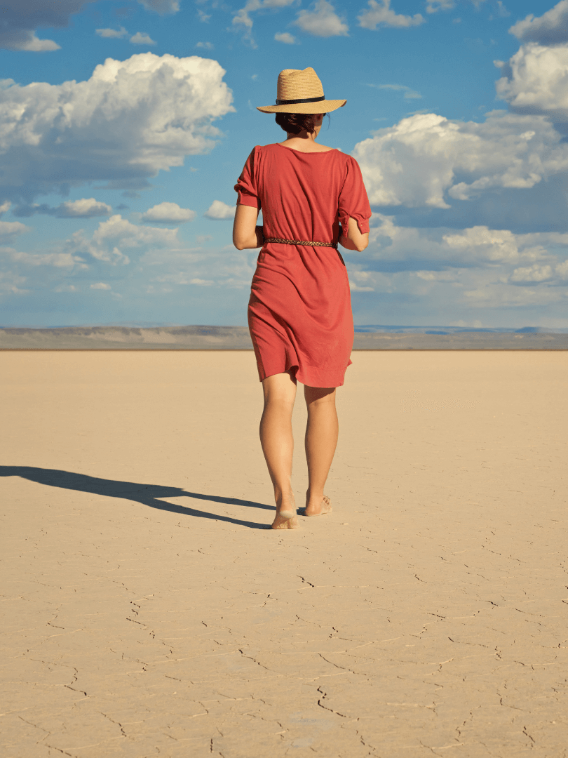 Woman walking on sand